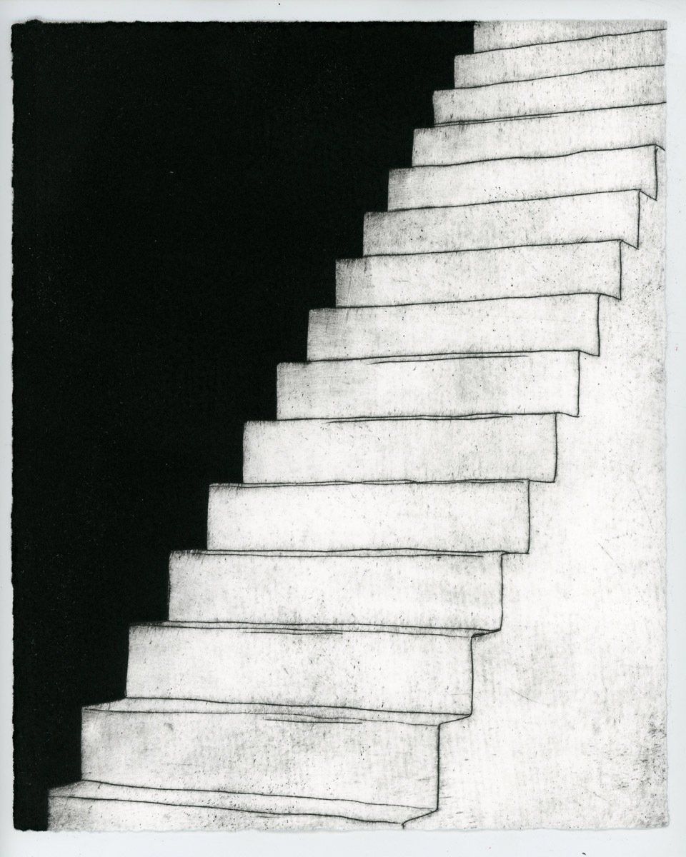 A black and white photo of a set of stairs
