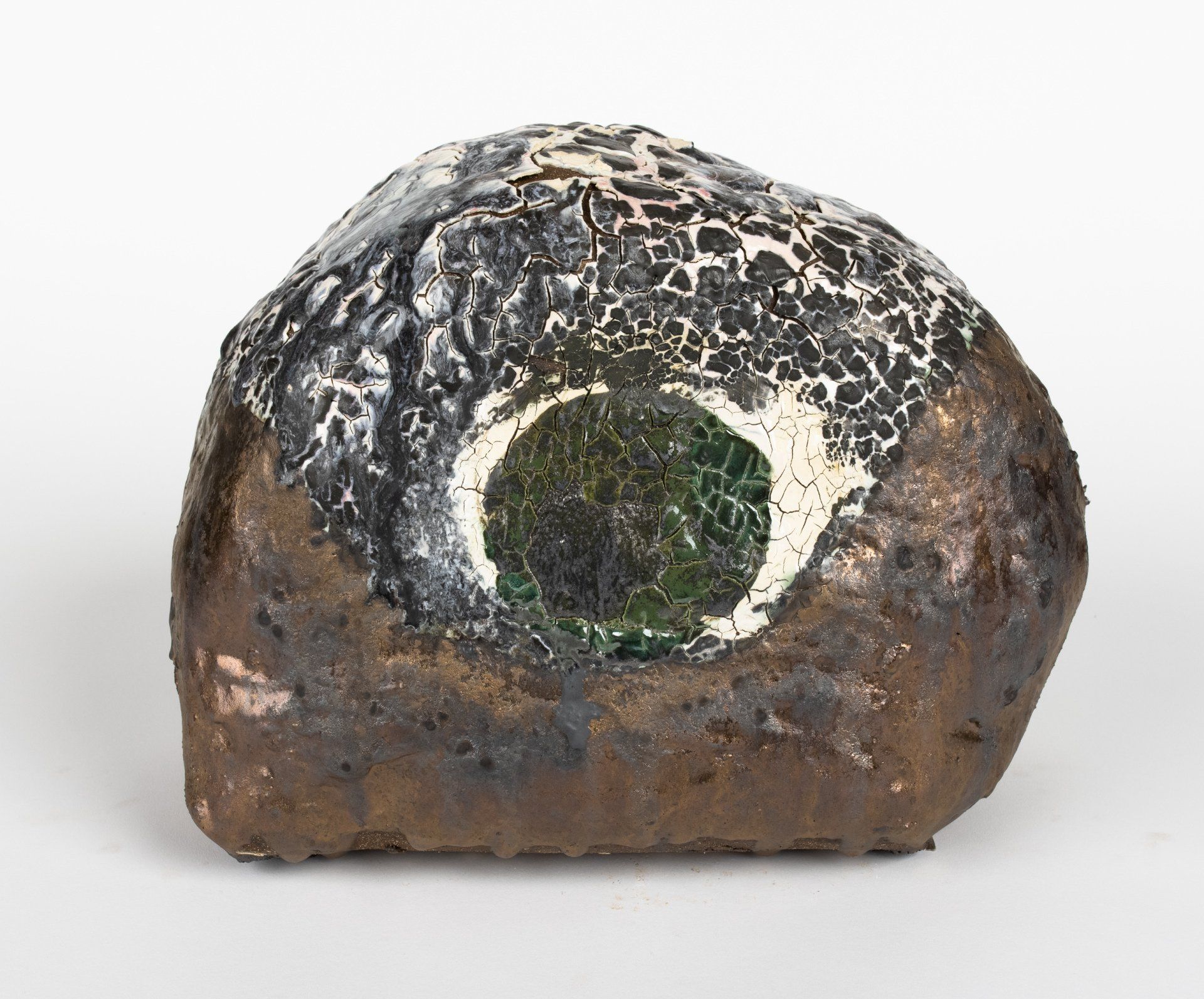 A rock with a hole in the middle of it