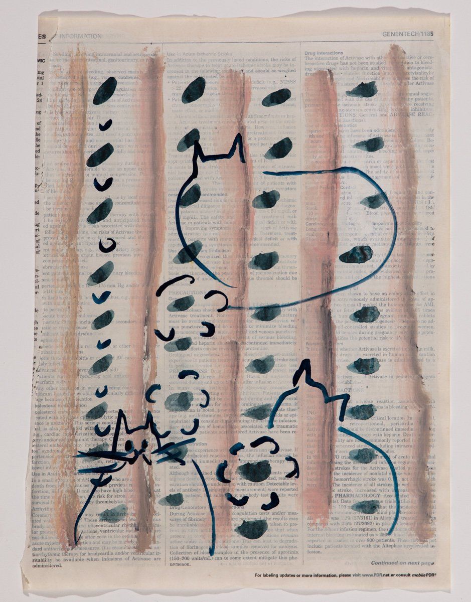 A drawing of a cat on a piece of paper