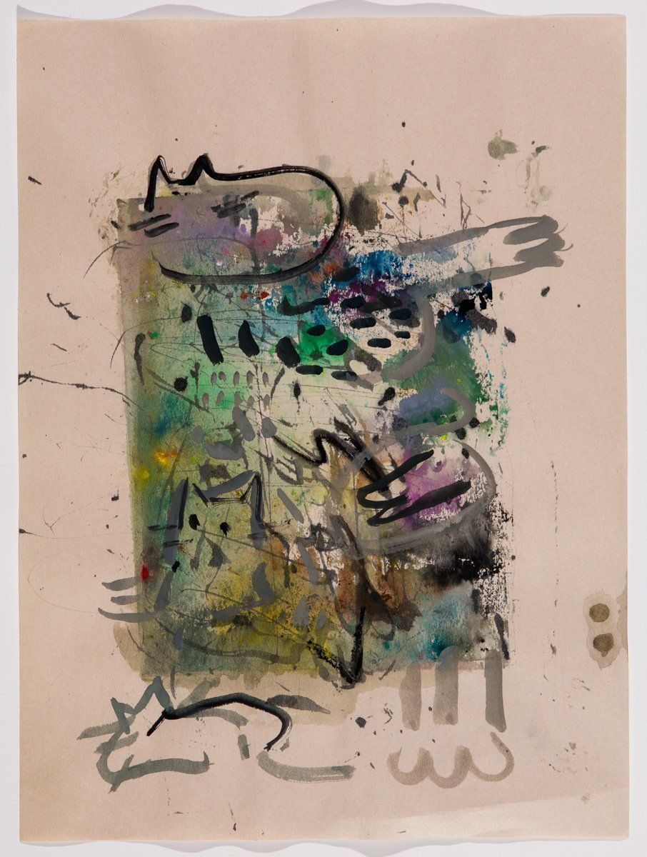 A painting with a drawing of a cat on it