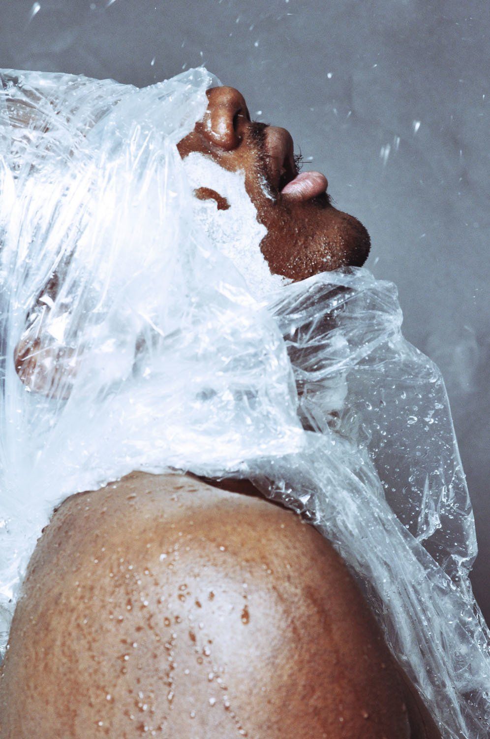 A close up of a person 's foot in the water.