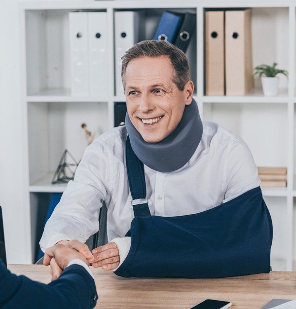 Worker in Neck Brace — Old Bridge, NJ — Edward Testino, Attorney at Law