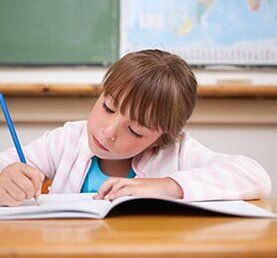 Focused Girl — Early Learning Center in Tiverton, RI Focused Girl — Early Learning Center in Tiverton, RI