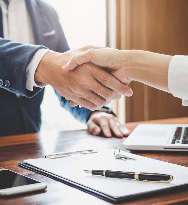 Estate Planning — Woman Shaking Hands with Attorney in Luzerne County, PA Estate Planning — Woman Shaking Hands with Attorney in Luzerne County, PA