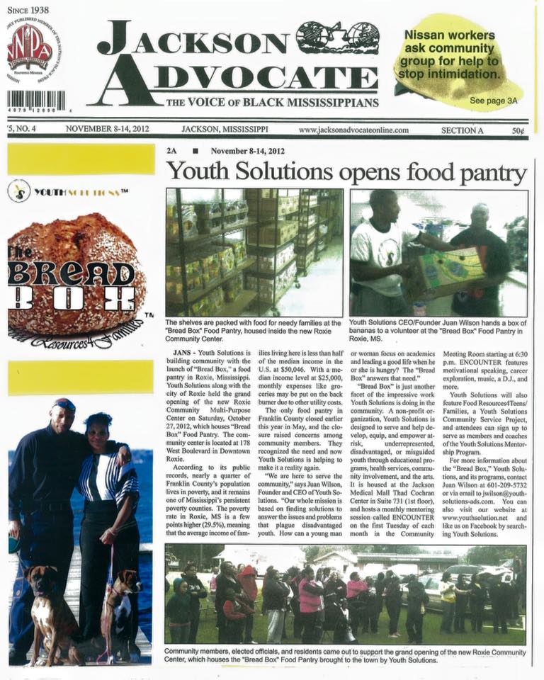Jackson Advocate newspaper front page: Youth Solutions opens food pantry; people volunteer.