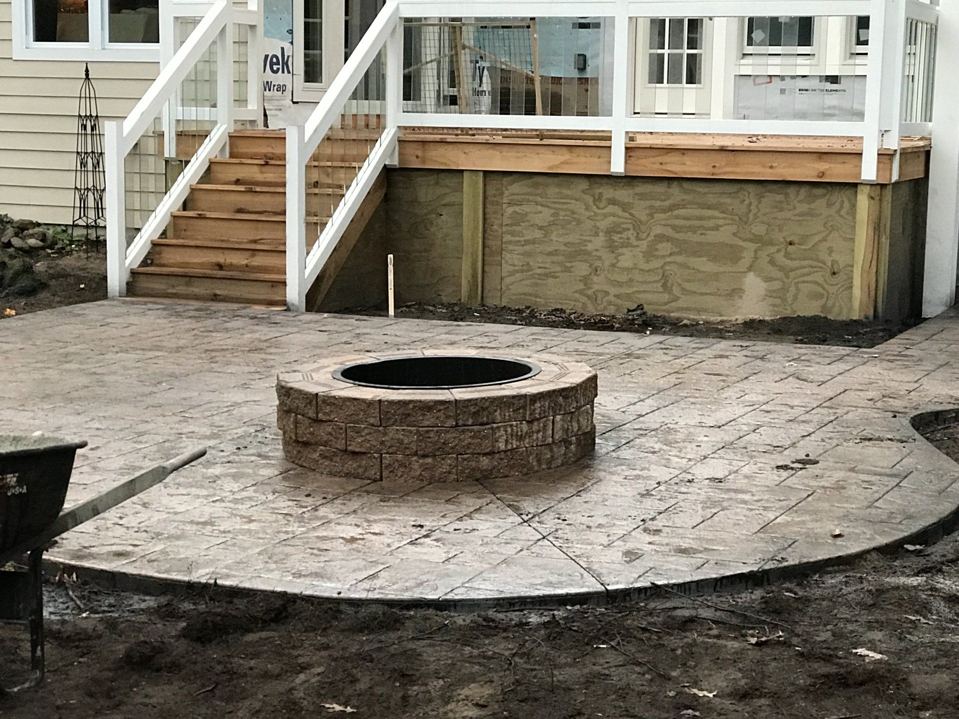 a decorative concrete & stone patio & stairs in the Traverse City, MI area