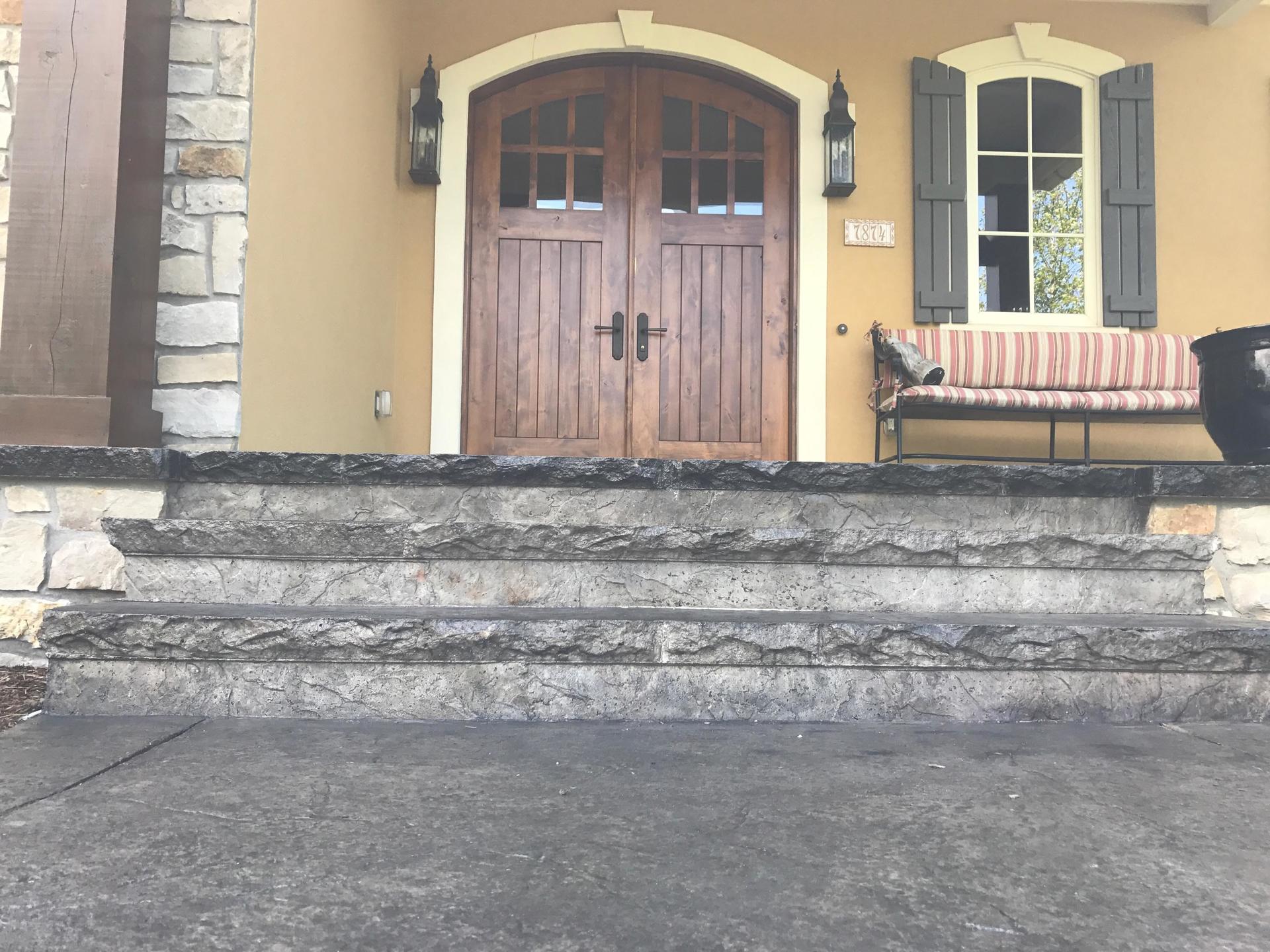 custom decorative stone patio and stairs in the Traverse City, MI area