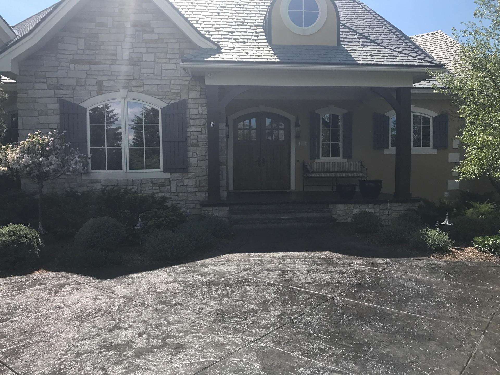 a professional decorative stone patio and stairs in Traverse City, MI
