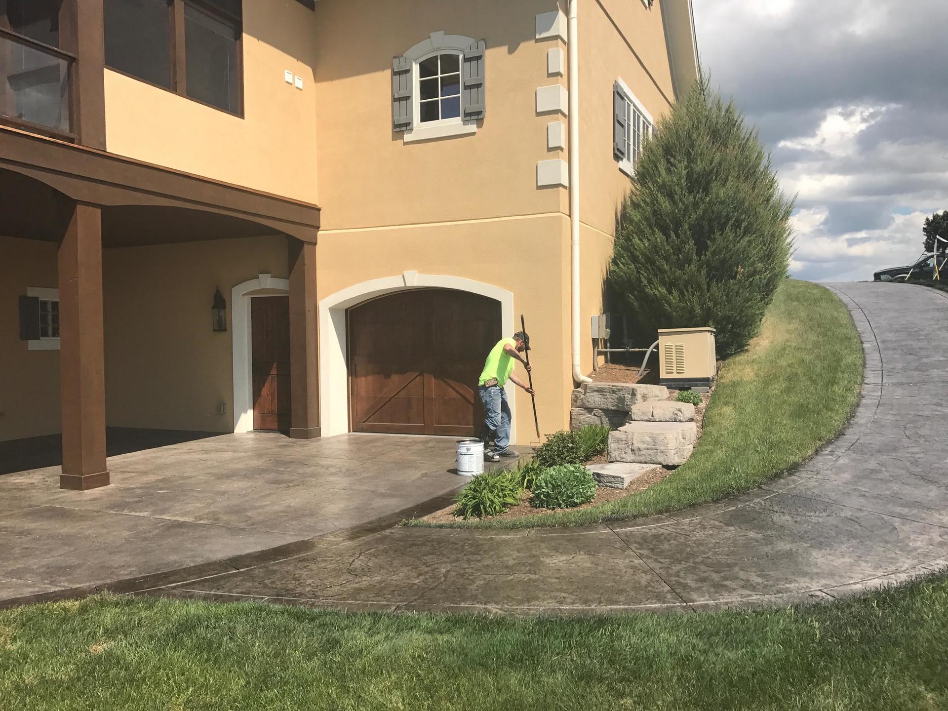 a decorative stone patio and stairs