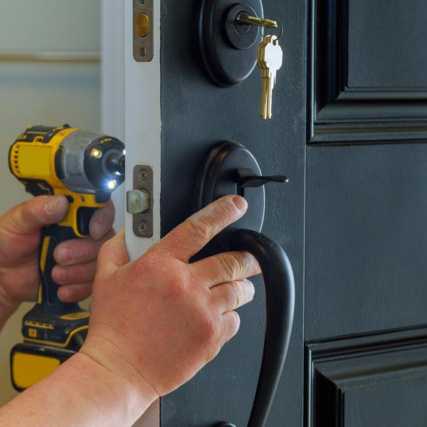 South Bend — Man Installing a New Door Lock in South Bend, IN South Bend — Man Installing a New Door Lock in South Bend, IN
