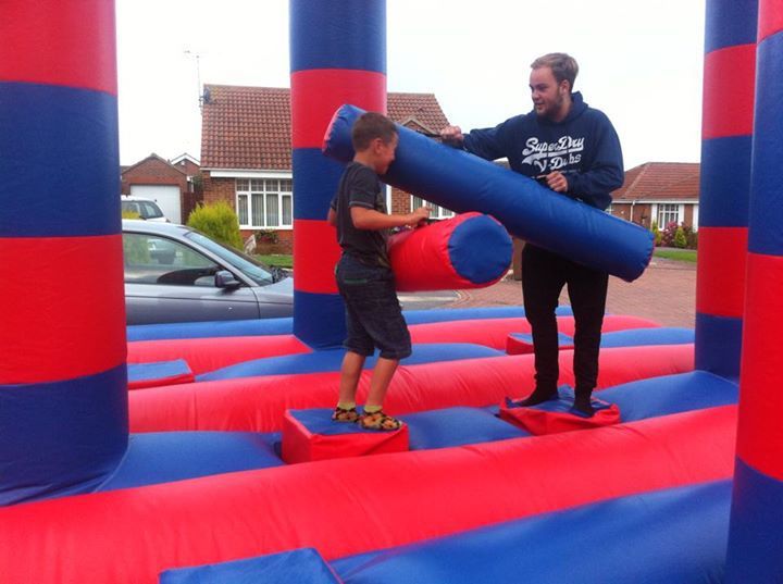 Kids playing on the Inflated bouncy castle