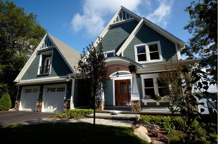 HardieShingle Evening Blue and arctic white trim.