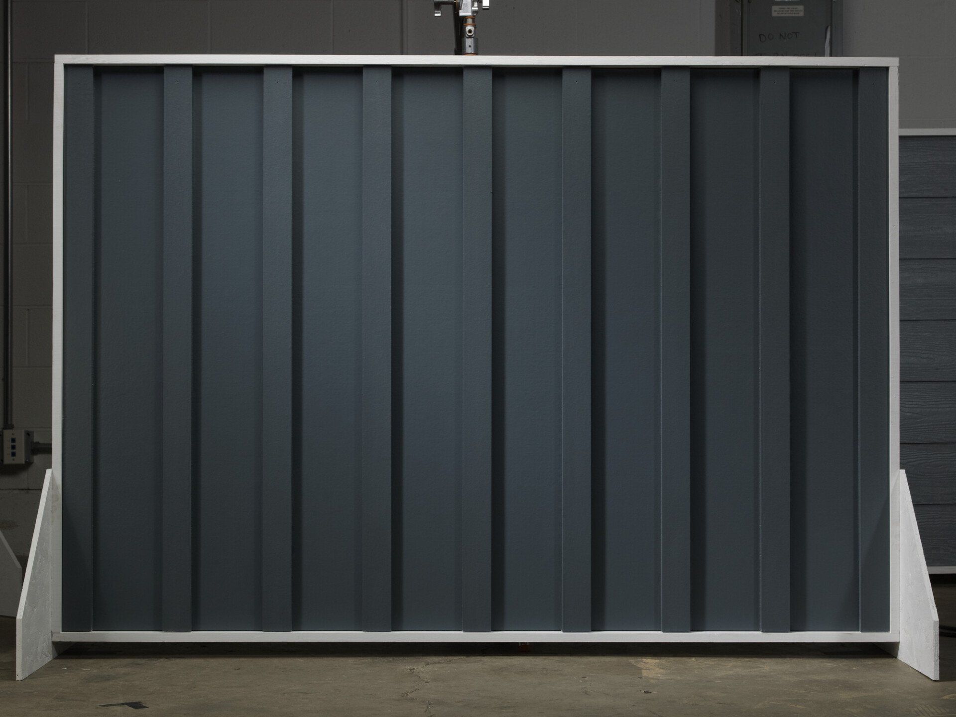 Smooth batten boards in Evening Blue ColorPlus by James Hardie.