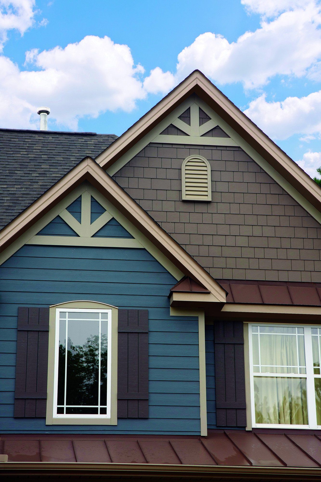 Evening Blue Siding with red brick