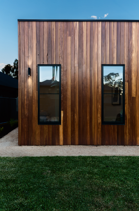 This is a picture of new modern-looking windows. The picture is showing the exterior windows of the house.