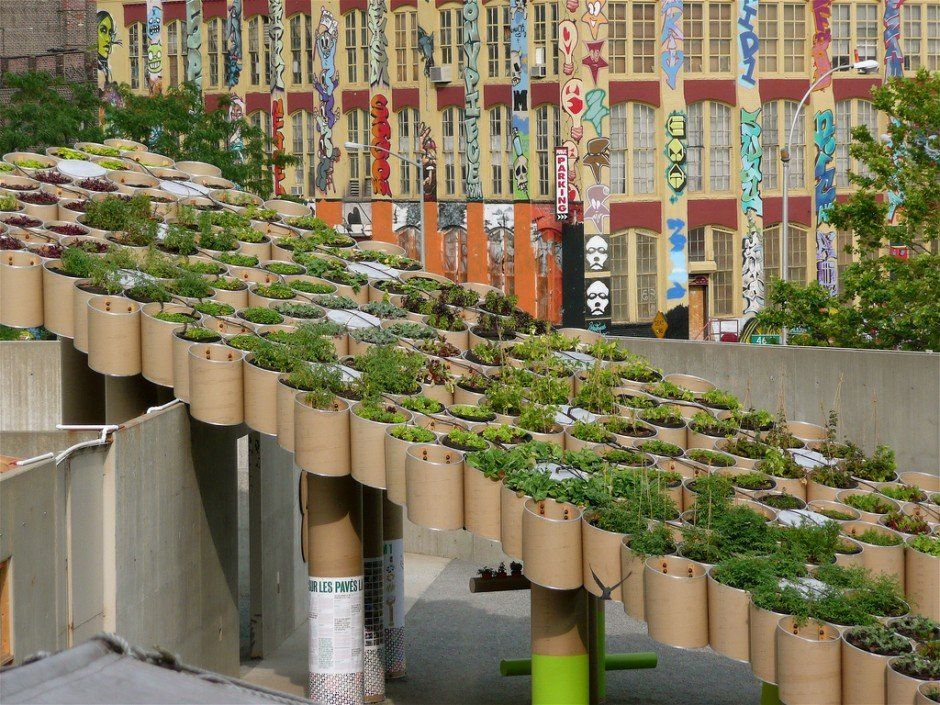 In Queens, New York, you will find not only a fully solar-powered art installation but also offers a community garden which provides all the benefits that a public farming co-op boasts. Believe it or not, there's even a chicken coop and a juicing station.
