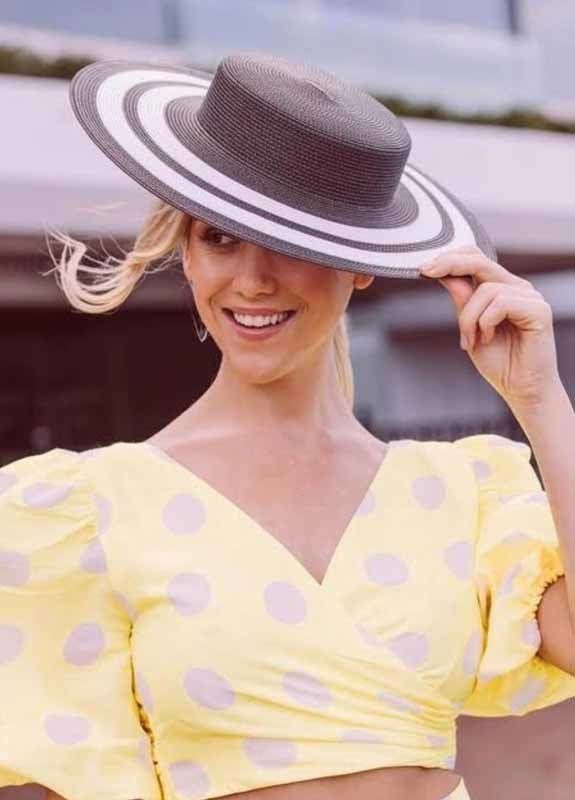 woman with grey striped hat