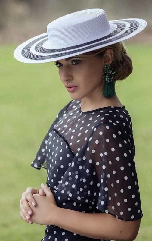 woman with white striped hat