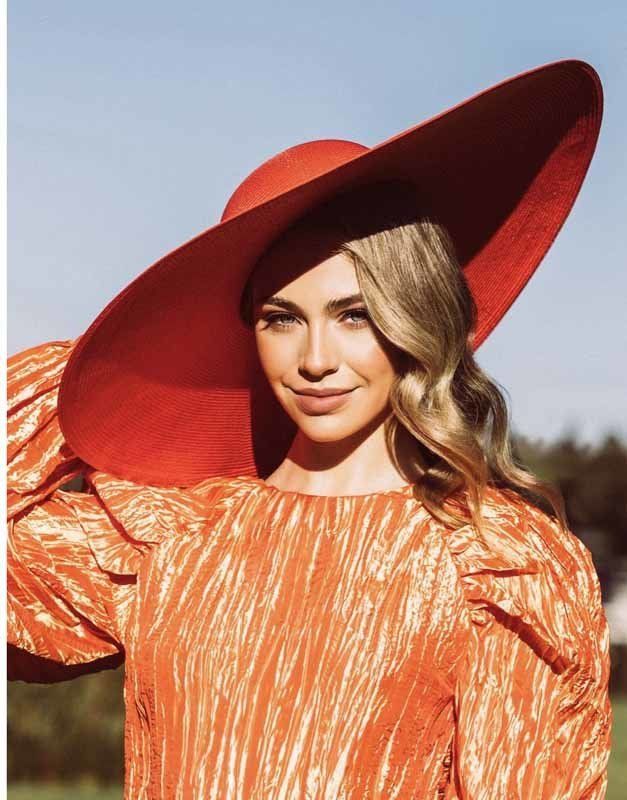 woman with large red hat