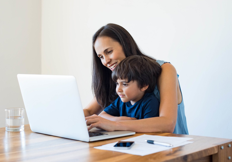 mother and young son have tele-neurology video visit