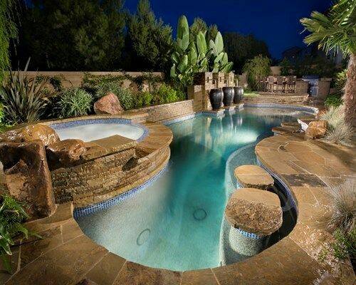 Swimming Pool With Jacuzzi And Stone Table— Jacksonville Beach, FL — The Batts Company