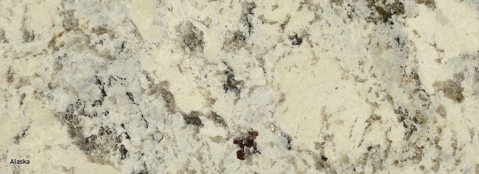 Cream-colored granite stone slab with grey and black mineral veining.