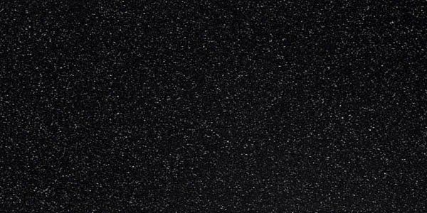 A textured background of solid, dark black with fine, subtle grey speckles.