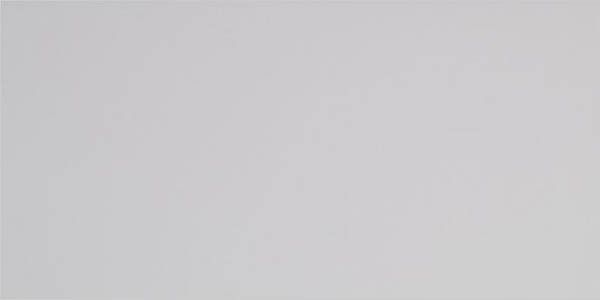 A textured light gray surface with a uniform, matte finish.
