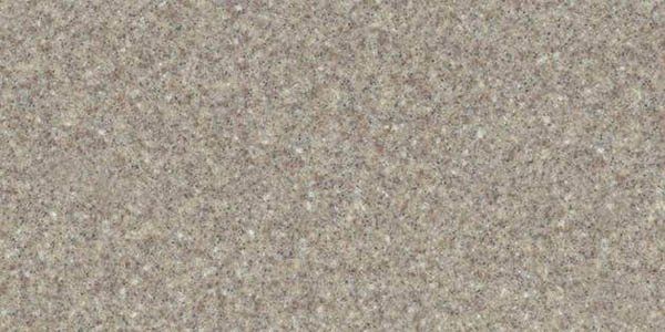 A close-up, textured surface in a neutral, sandy beige color with fine, speckled particles.
