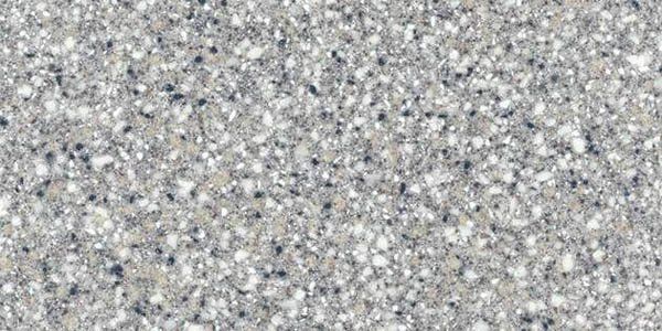 A close-up texture of gray, white, and black speckled aggregate, resembling polished concrete or terrazzo flooring.