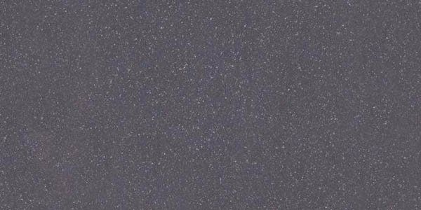 A solid, dark gray background with a fine, granular texture.