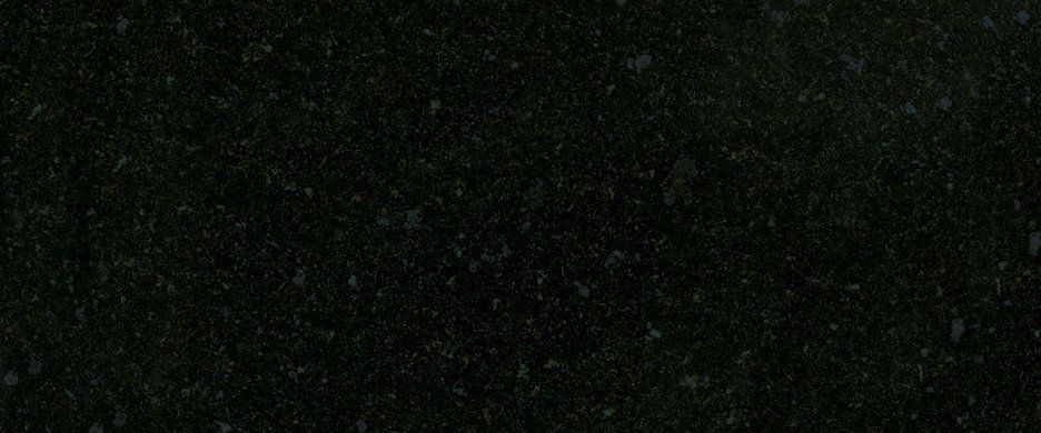 Close-up view of a dark, black-toned stone surface featuring fine, subtle grey speckles and a smooth, polished texture.