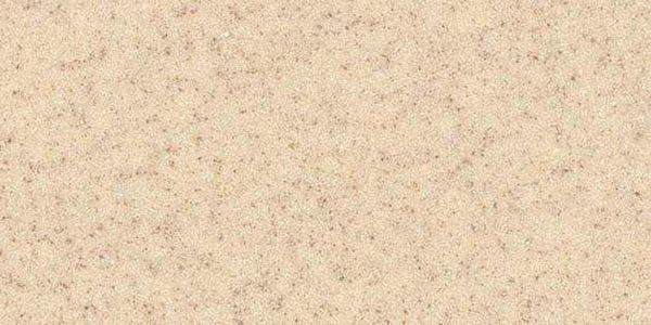 A textured background surface in a light beige, tan color with subtle, darker speckles throughout.