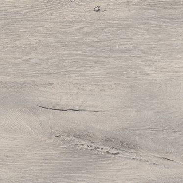 A close-up view of light gray wood-grain flooring with subtle textures, knots, and a natural linear pattern.