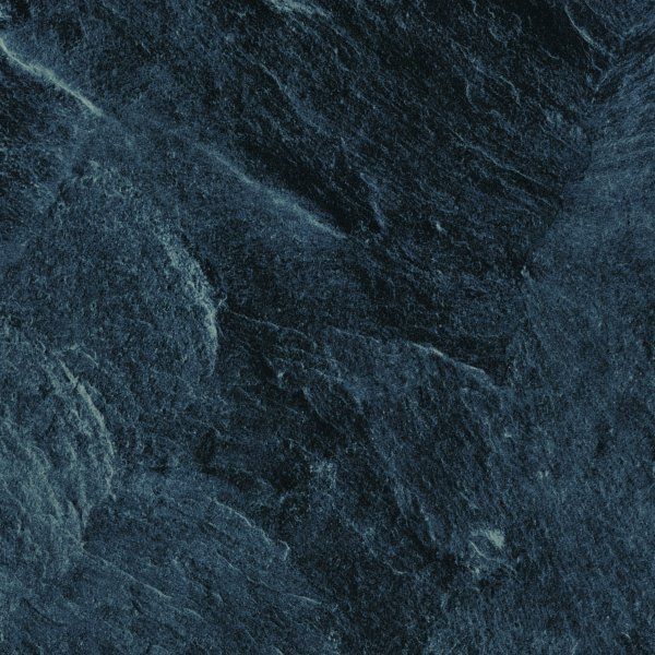 A dark blue slate texture with visible, layered stone grain and rough, uneven surface patterns.