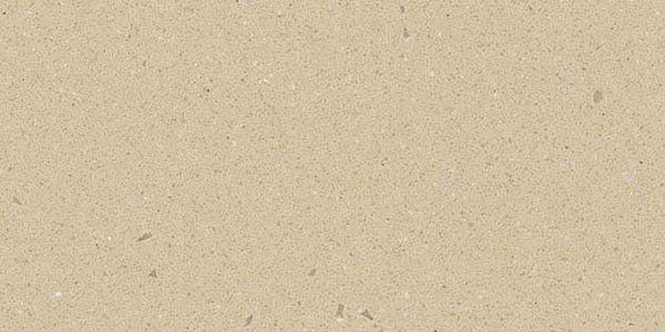 A uniform, textured surface featuring a light tan or beige color with subtle, small flecks distributed throughout.