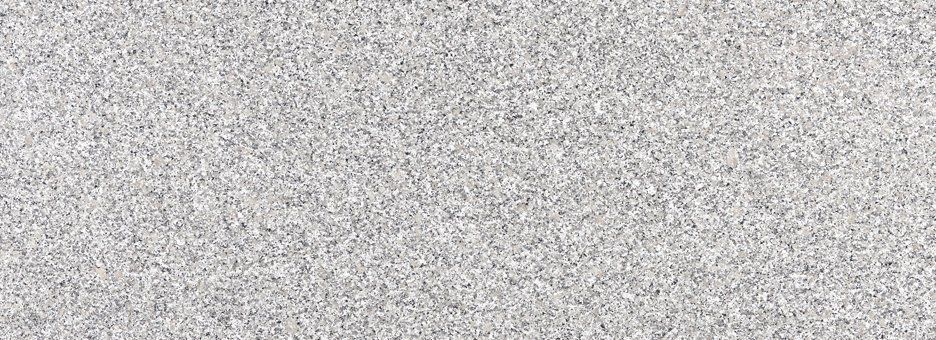 A uniform, close-up texture of light gray, speckled material resembling fine-grained sand or gravel.