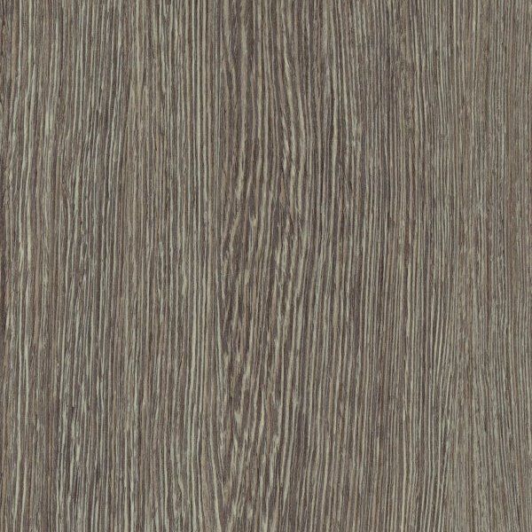 A close-up of a wood grain texture with vertical light and dark brown streaks.