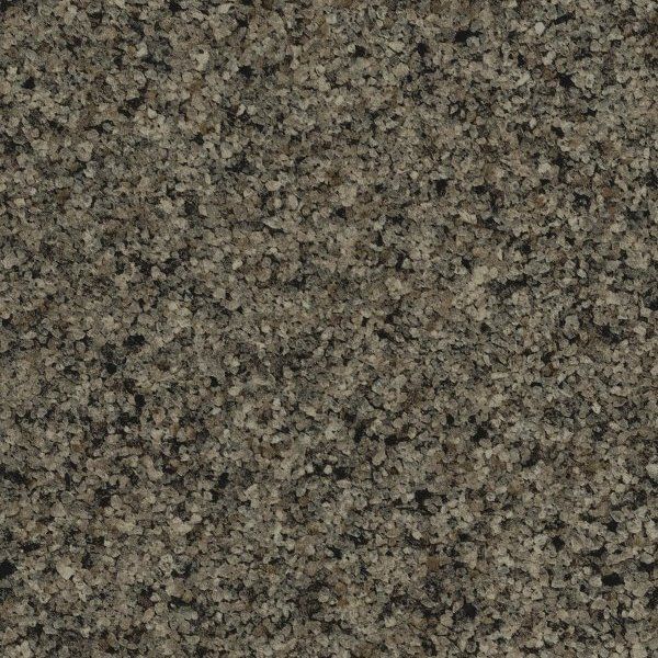 A close-up of a speckled stone texture featuring a mix of dark gray, tan, and white granular patterns.