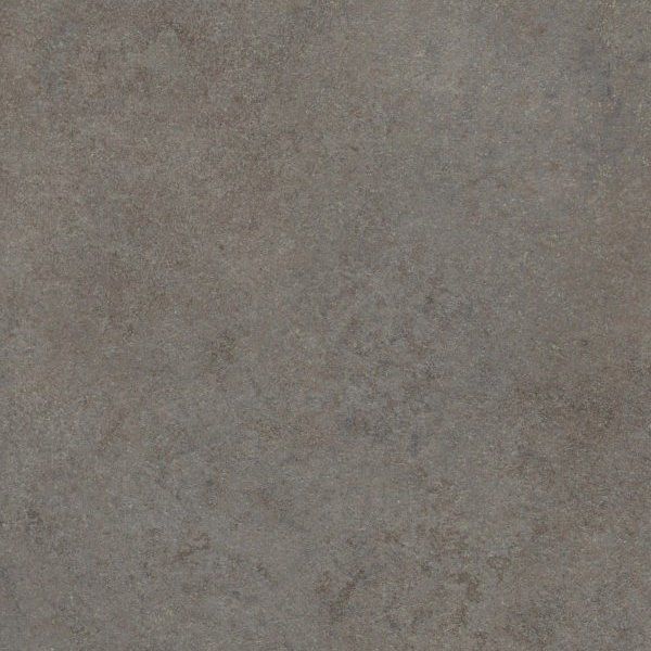 A textured surface featuring a mottled pattern of cool grey and brown tones, resembling stone or concrete.