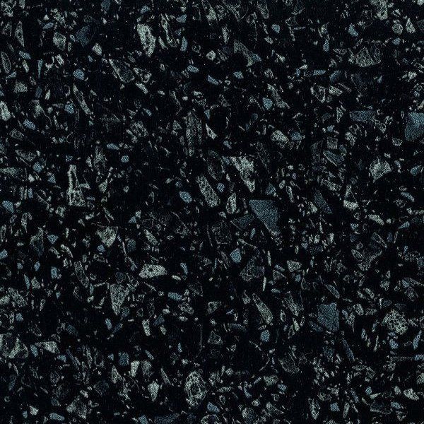 A close-up texture of small, dark, angular black and charcoal gray stones or granules packed closely together.