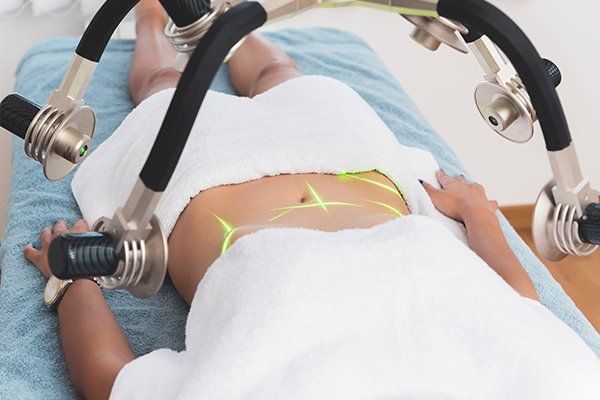 Non-Invasive Body Shaping Session — Bayfield, CO — Pine River Chiropractic Care, Acupuncture & Massage Therapy Non-Invasive Body Shaping Session — Bayfield, CO — Pine River Chiropractic Care, Acupuncture & Massage Therapy