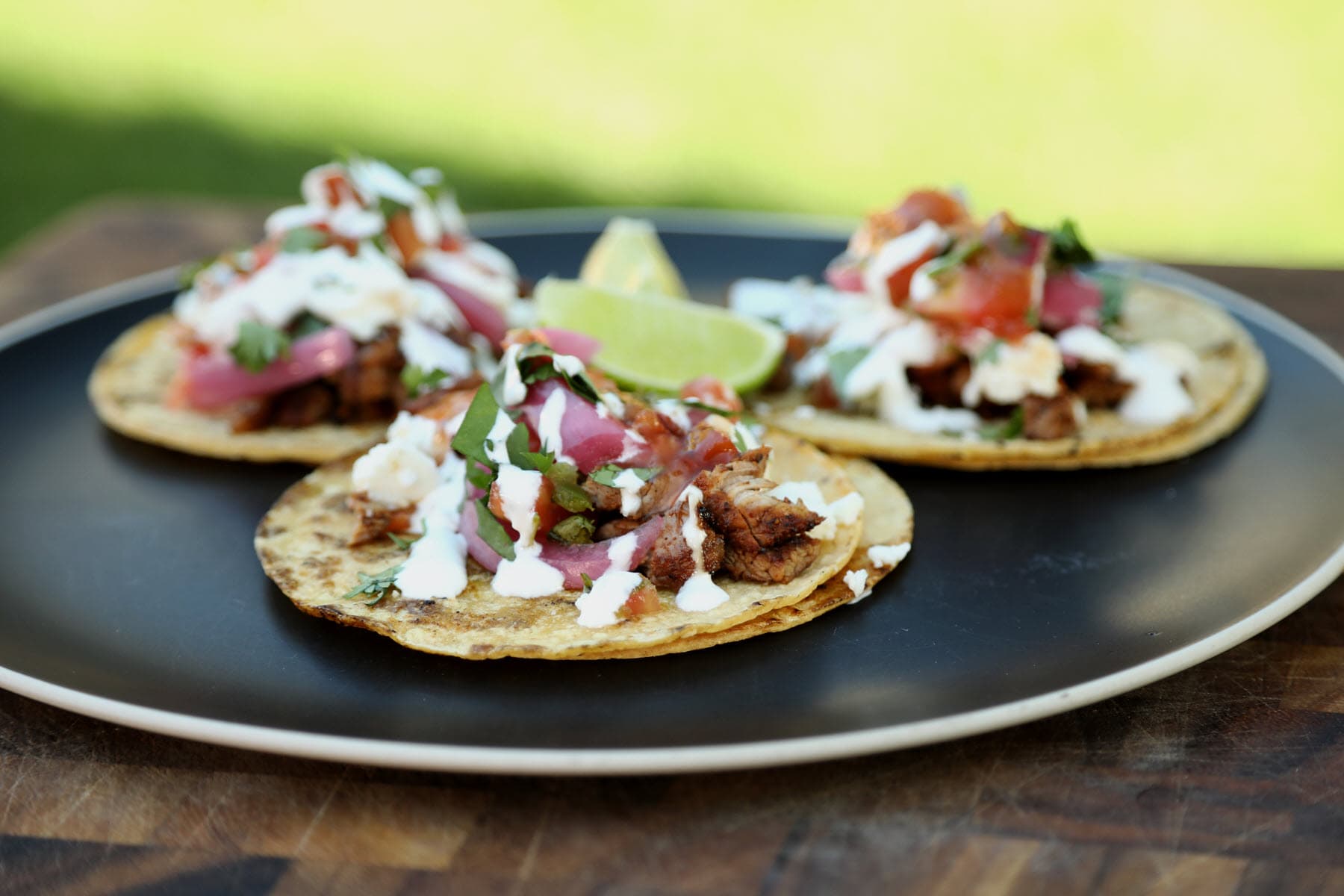 grilled  pork tenderloin street tacos on a plate