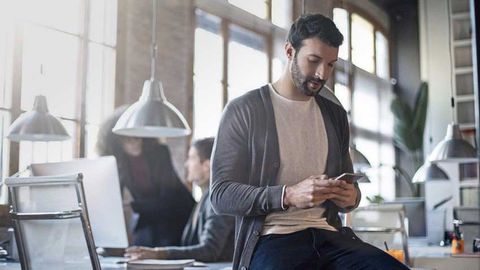 A man checking his phone