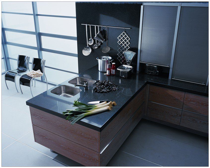 Black colour quartz surface installed on the storage cabinets