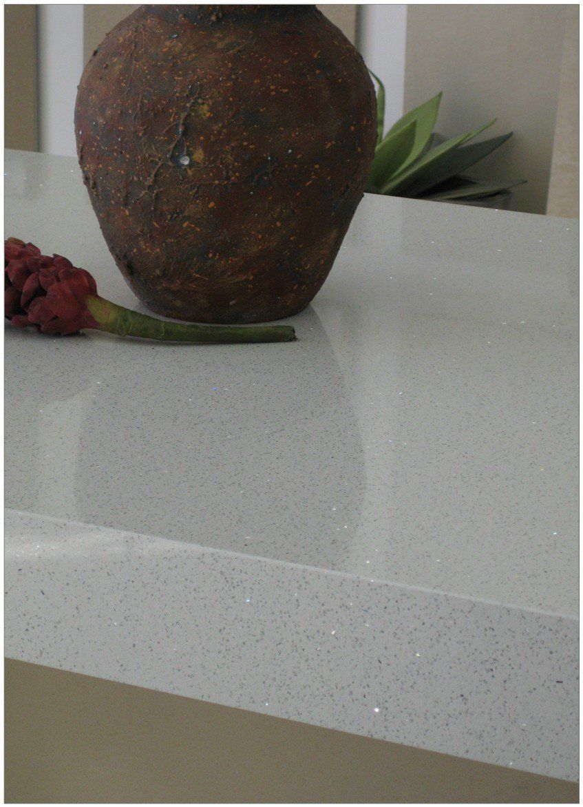 White colour quartz surface installed in the kitchen