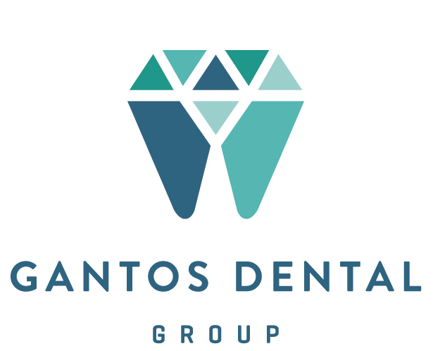 A logo for santos dental group with a diamond in the middle