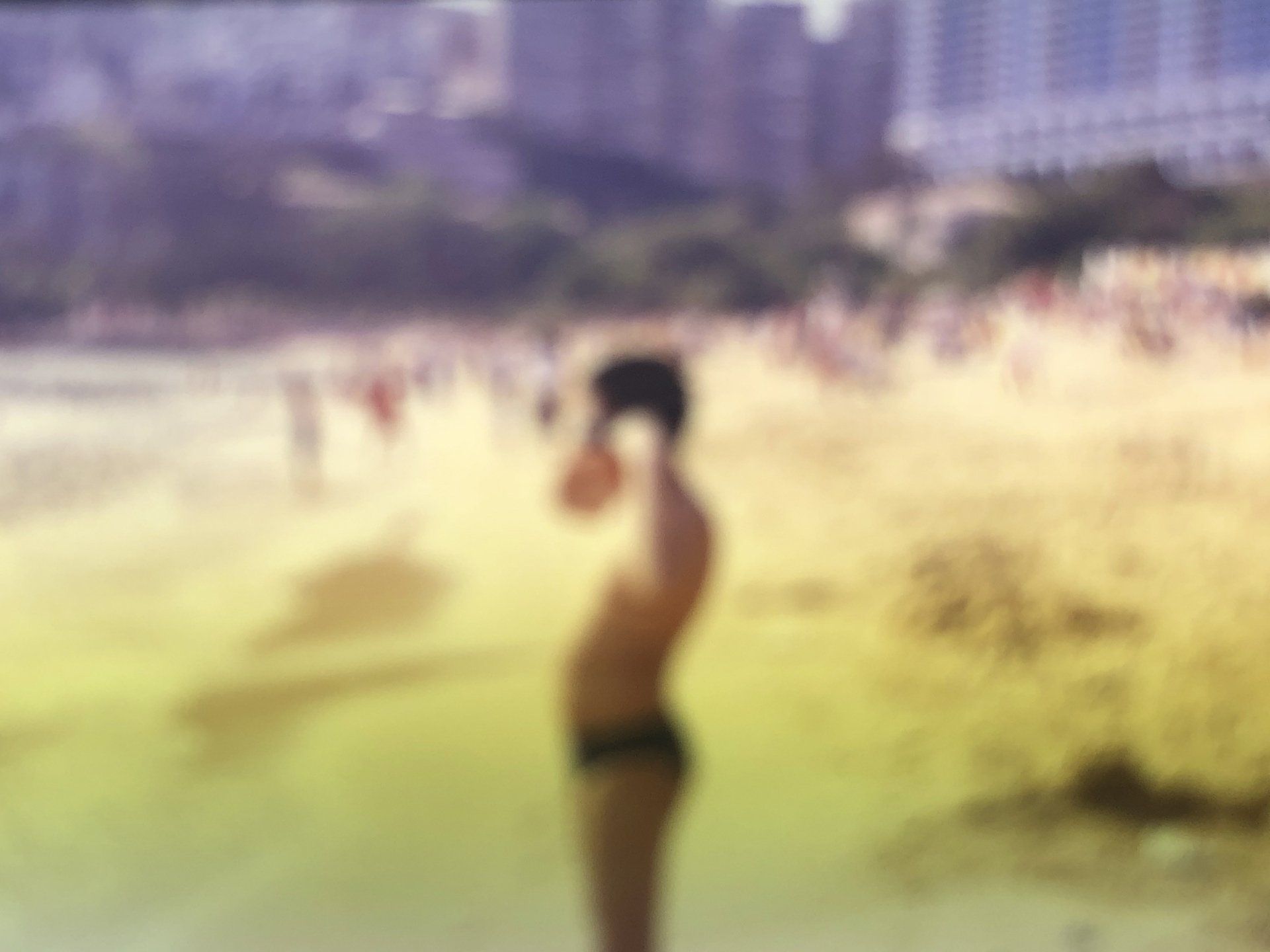 A boy at Repulse Bay beach during SARS, 2003. Kodak E100VS slide, 35mm. (2019) 75x100cm. Archival pigment print.
