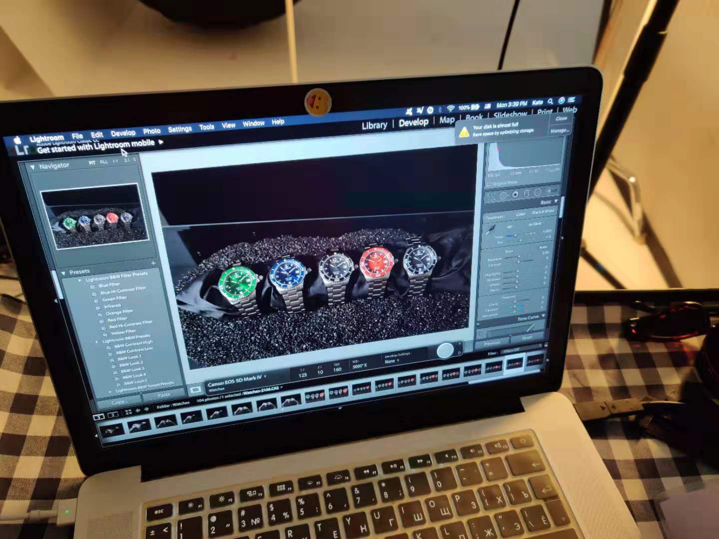 A laptop with a picture of watches on the screen