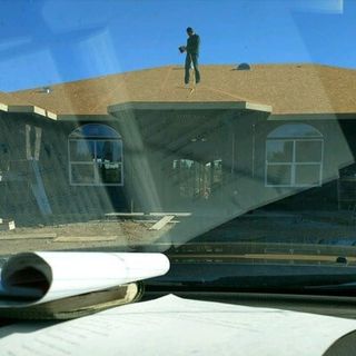 Man on the roof — roofing in Galt, CA Man on the roof — roofing in Galt, CA